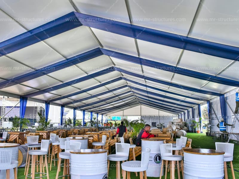 luxury white event tent with chandeliers
