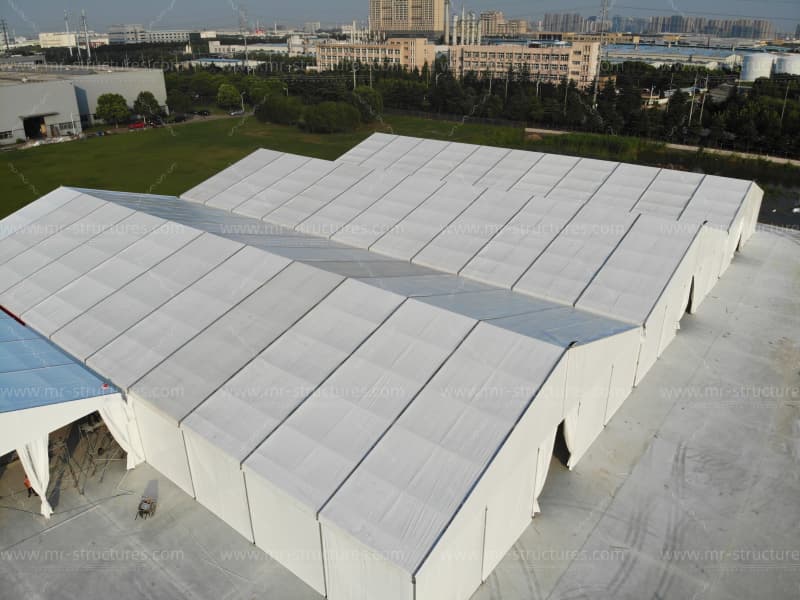 aerial view of multiple warehouse tents