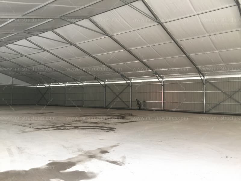 large empty warehouse tent interior