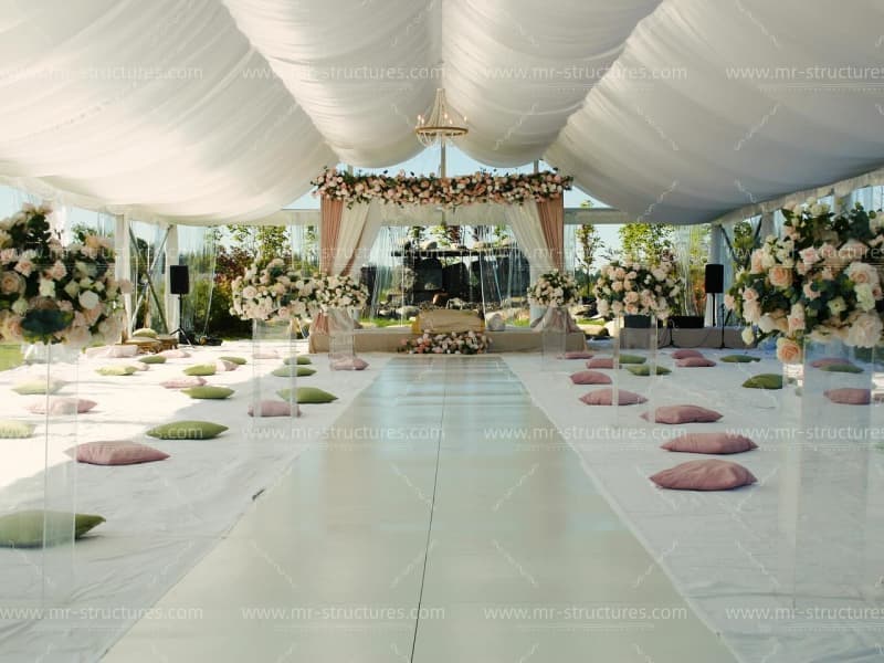 large church tent setup with flowers