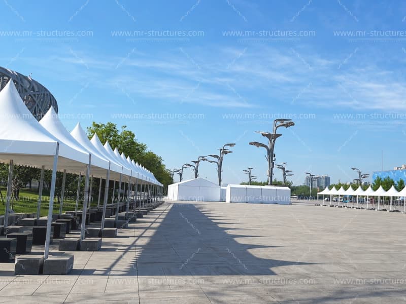 Aluminum outdoor tent complex with pagoda tents at stadium
