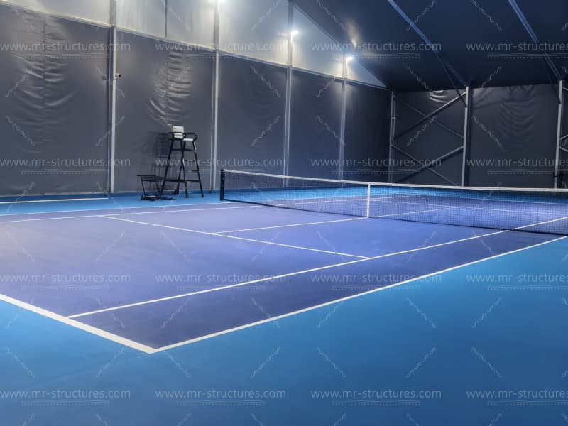 indoor tennis court match setup