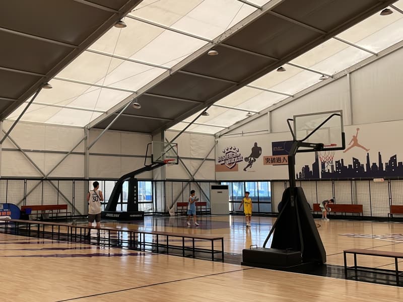 covered basketball court active game